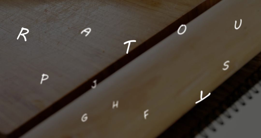 Floating Letters Above Notebook Representing Creative Learning Process