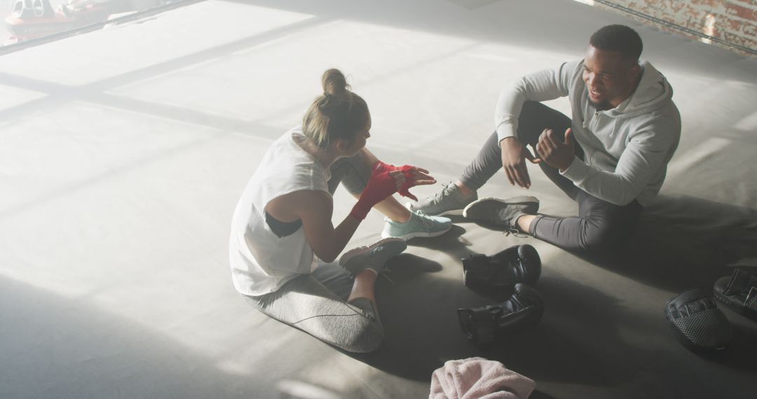 Personal Trainer Motivating Female Boxer in Sunlit Studio - Free Images, Stock Photos and Pictures on Pikwizard.com