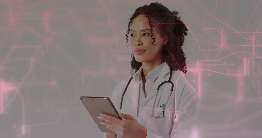 Doctor with Lap Tablet and Stethoscope Analyzing Futuristic Data