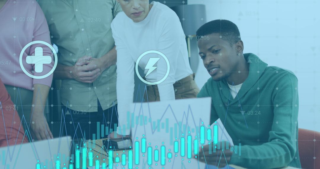 Diverse Team Discussing Medical Technology Reports in Office