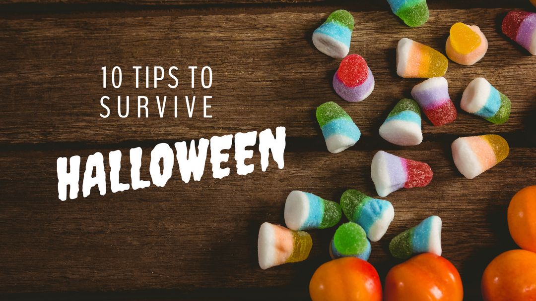 Colorful Halloween Candies on Rustic Wooden Surface