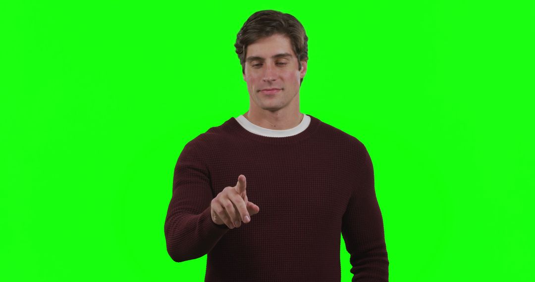 Man Touching Interactive Screen with Green Background - Free Images, Stock Photos and Pictures on Pikwizard.com