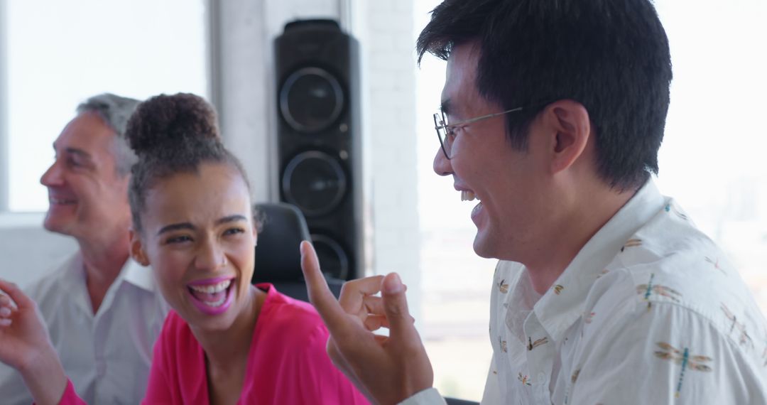 Diverse Colleagues Laughing During Office Break