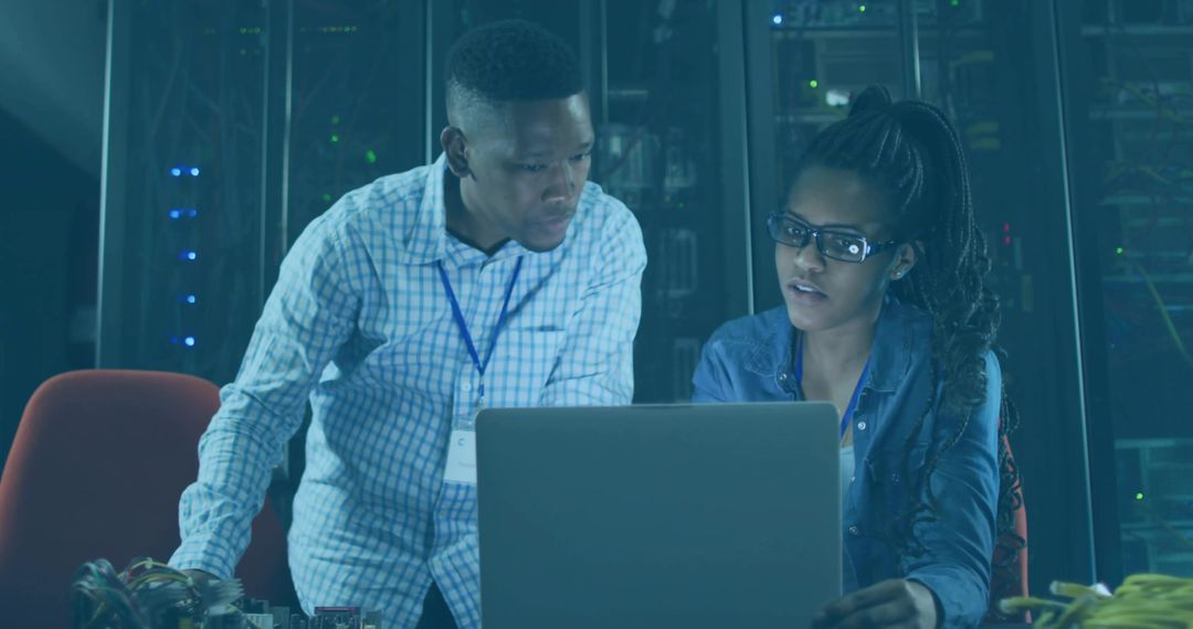 IT Professionals Collaborating in Data Center