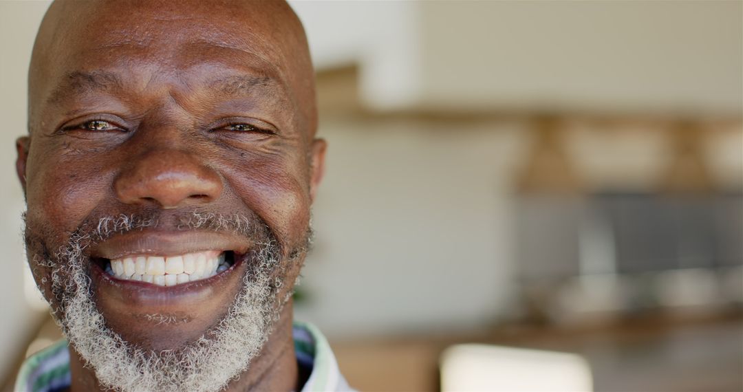 Close-Up of Smiling Mature Man Radiating Positivity