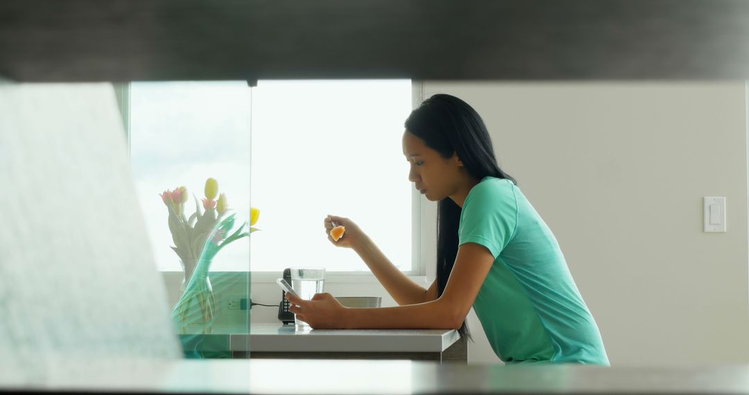 Woman Preparing Medication in Modern Kitchen - Free Images, Stock Photos and Pictures on Pikwizard.com