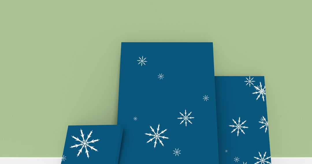 Snowflakes Falling on Blue Canvas Against Pastel Green Wall