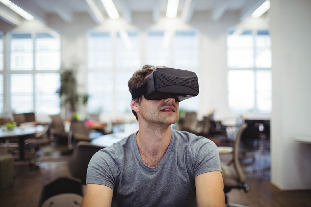 Man Experiencing Virtual Reality Modern Office