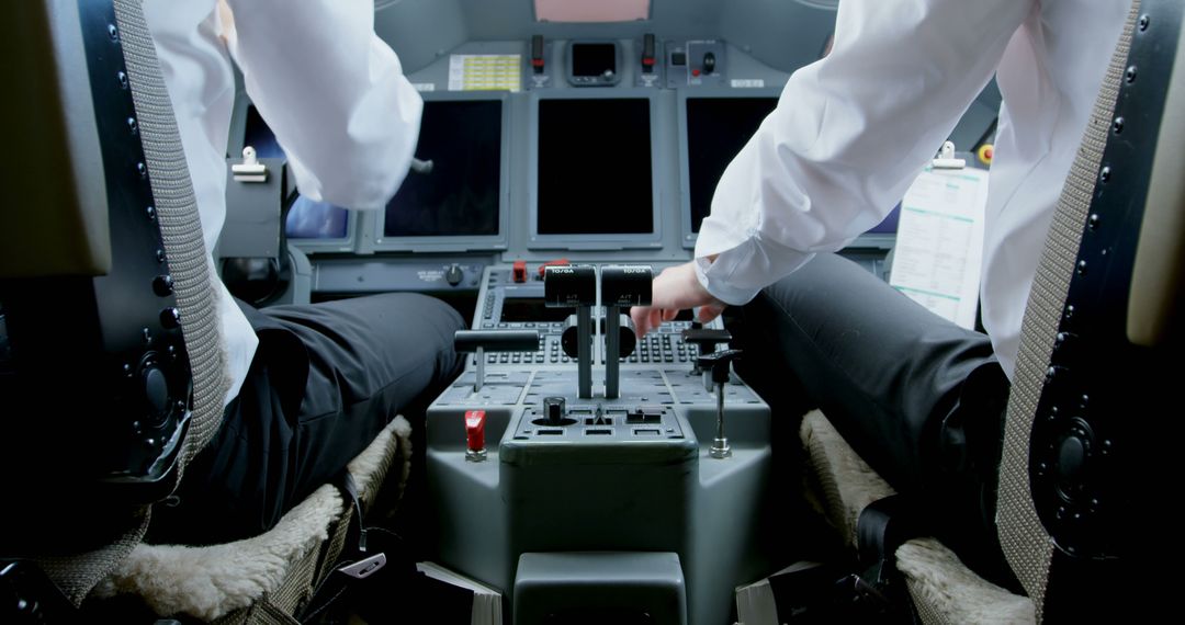 Commercial Airline Pilots Preparing for Takeoff in Cockpit - Free Images, Stock Photos and Pictures on Pikwizard.com