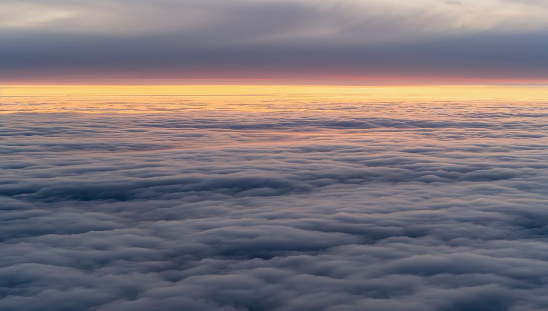 Soothing Cloudscape at Sunrise with Soft Pastel Hues