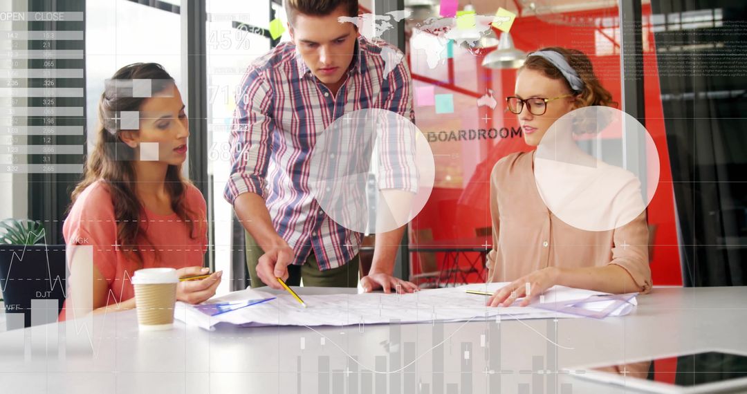 Team Collaborating Over Blueprint with Financial Data Overlay