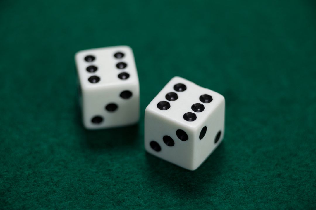 Pair of dice on poker table - Free Images, Stock Photos and Pictures on Pikwizard.com