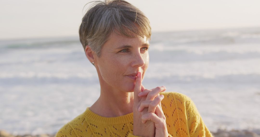 Pensive Woman Enjoying Sunset at Beach - Free Images, Stock Photos and Pictures on Pikwizard.com