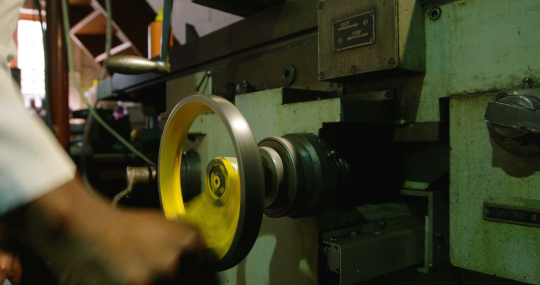 Close-up of Worker Using Industrial Lathe Machine for Precision Milling - Free Images, Stock Photos and Pictures on Pikwizard.com