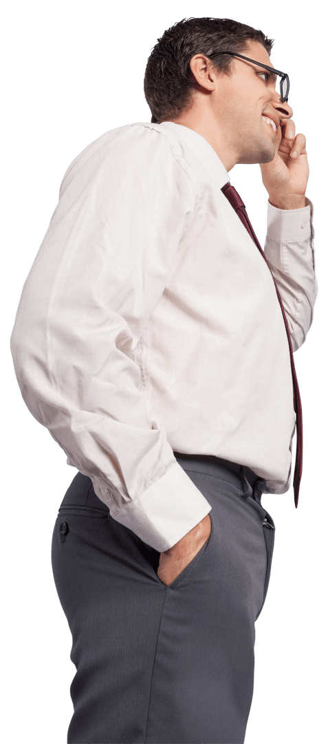 Smiling Businessman Holding Phone in Hand and Standing