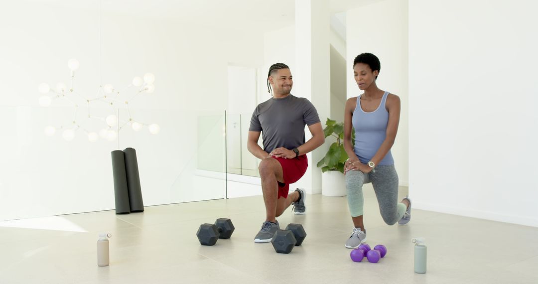 Fit Duo Embracing Fitness Routine with Weights at Home