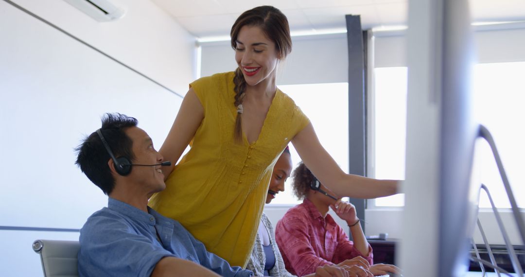 Team Collaboration in Modern Office Setting with Headset Communication