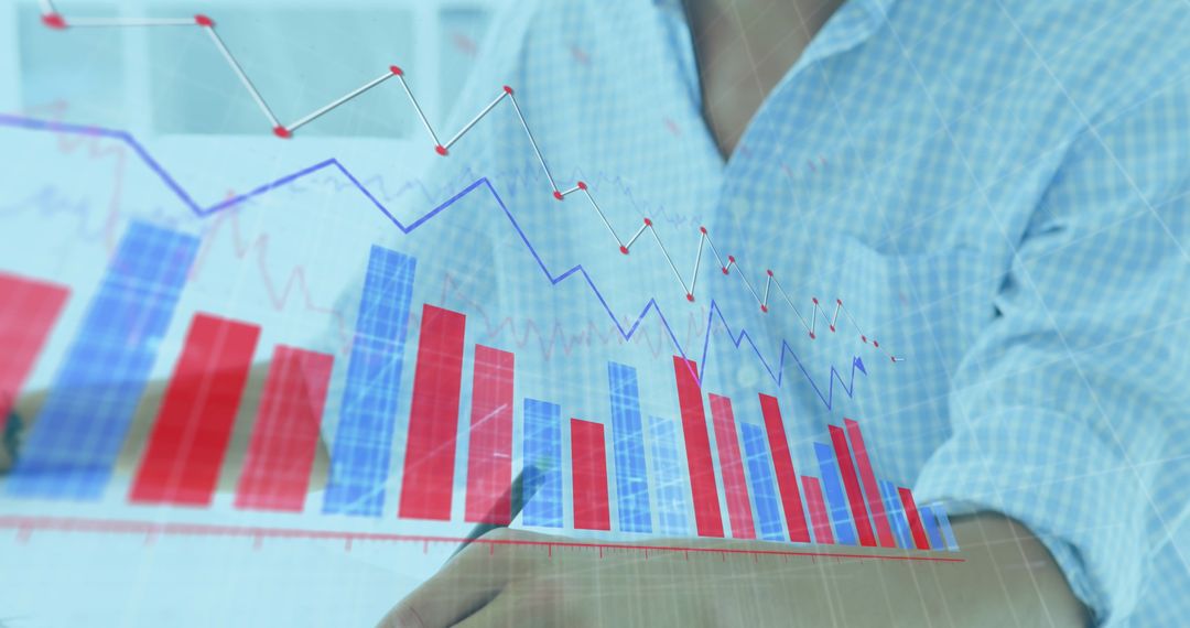 Businessman Analyzing Data with Digital Tablet and Graphical Trends