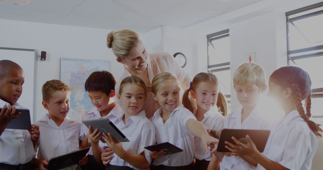 Teacher Engaging Students with Technology in Classroom Setting