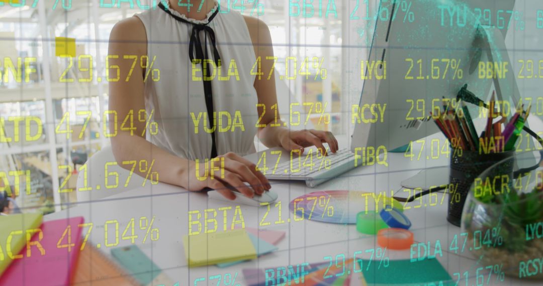 Businesswoman Analyzing Trading Data on Desktop
