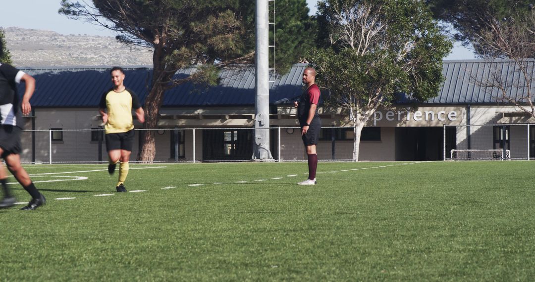 Team in Training Focusing on Soccer Skills on Sunny Day