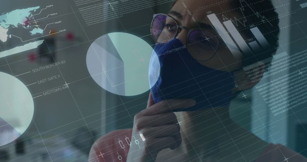 Woman Wearing Face Mask Analyzing Data in Digital Interface