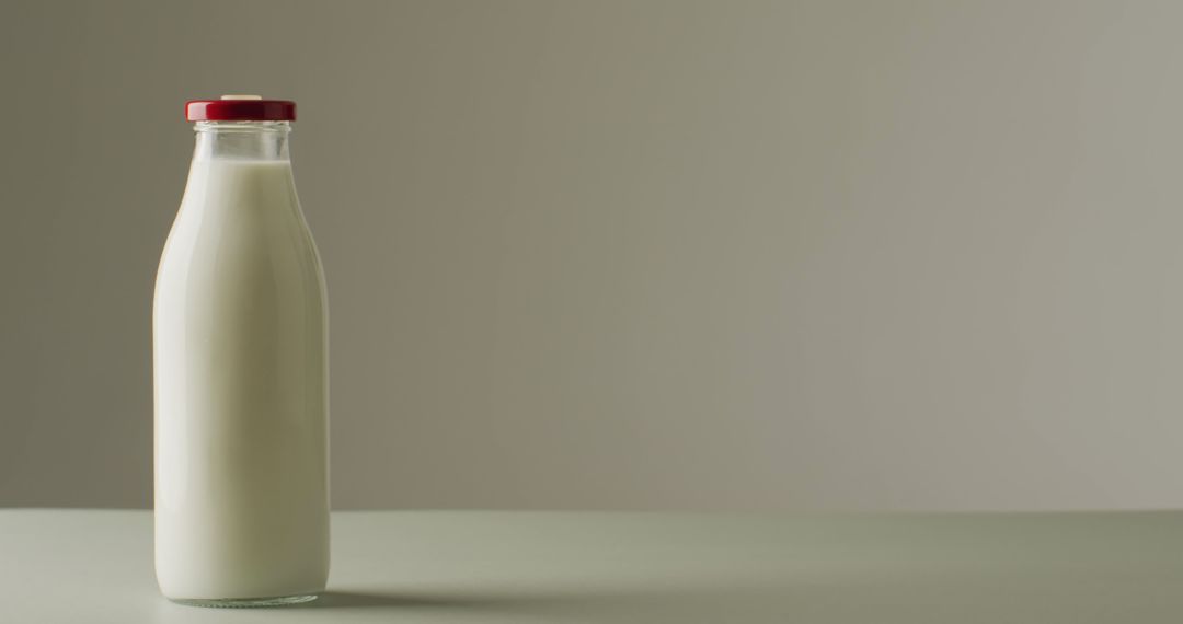 Glass Bottle of Fresh Milk on Light Background - Free Images, Stock Photos and Pictures on Pikwizard.com