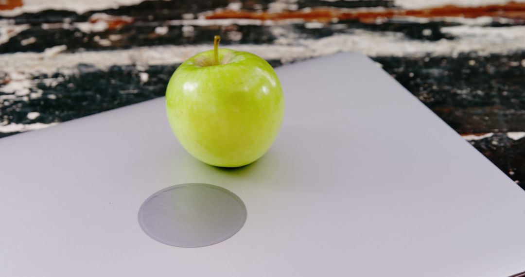 Fresh Green Apple on Rustic Surface Highlighting Healthy Eating