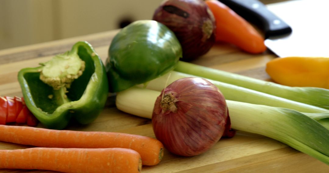 Fresh Vegetables on Wooden Cutting Board in Kitchen - Free Images, Stock Photos and Pictures on Pikwizard.com