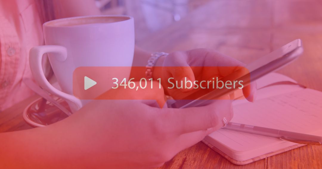 Growing Subscriber Count on Smartphone Screen at Cozy Cafe