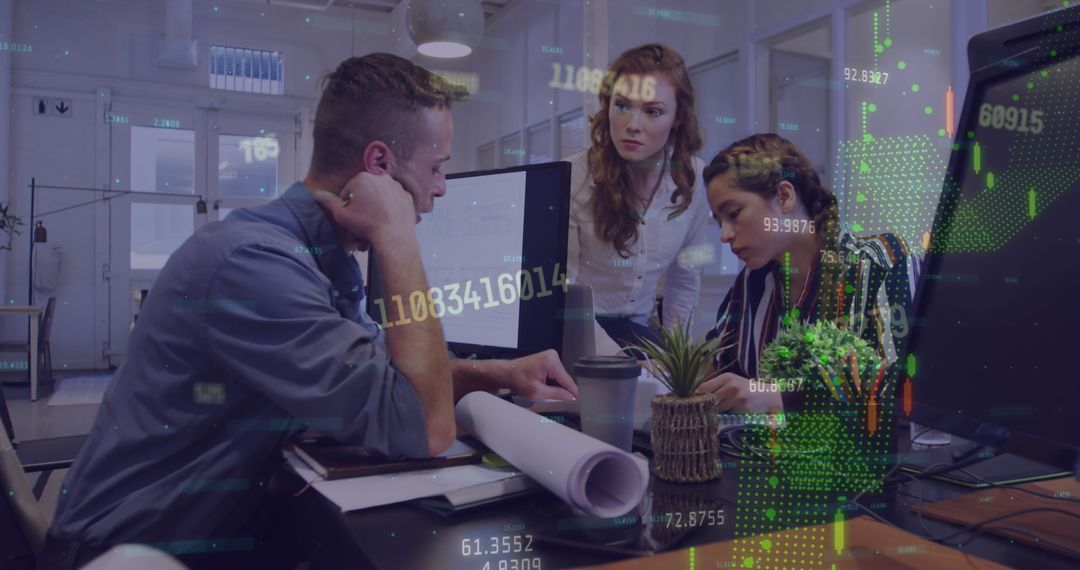 Diverse Team Analyzing Digital Data in Modern Office