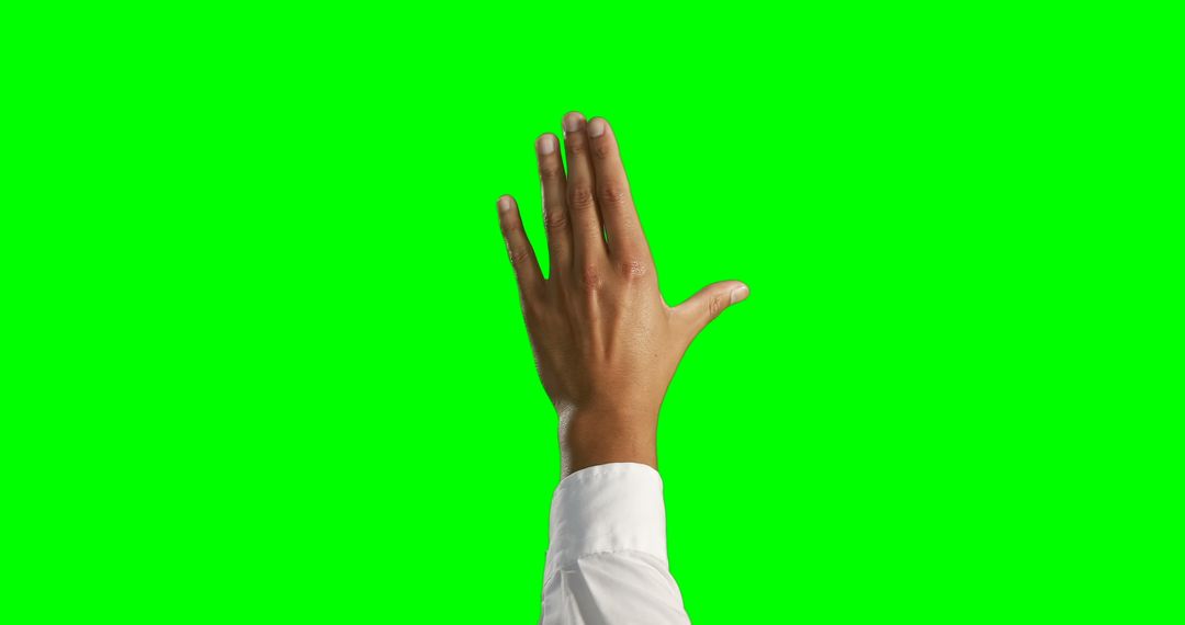 Hand Gesturing in Front of Green Screen Background - Free Images, Stock Photos and Pictures on Pikwizard.com