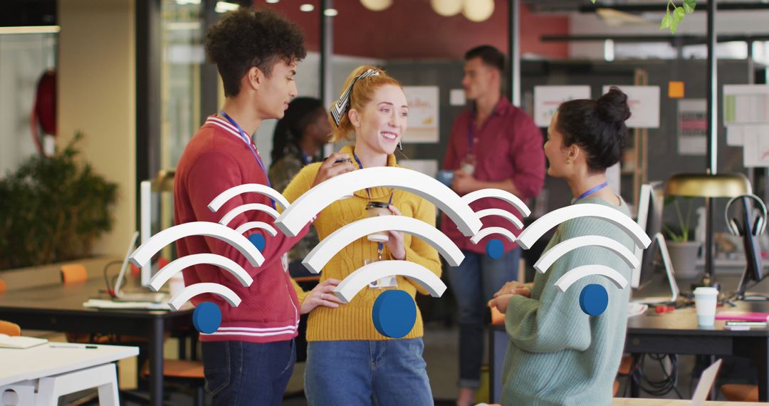 Diverse Colleagues Discussing Technology Solutions in Modern Office