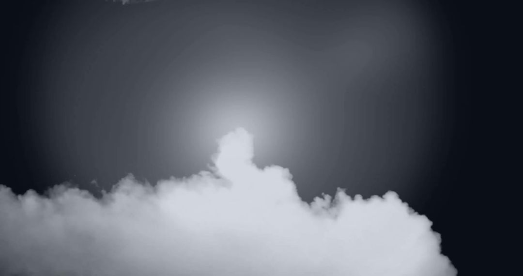 Luminous Light and Billowing Cloud Over Dark Backdrop