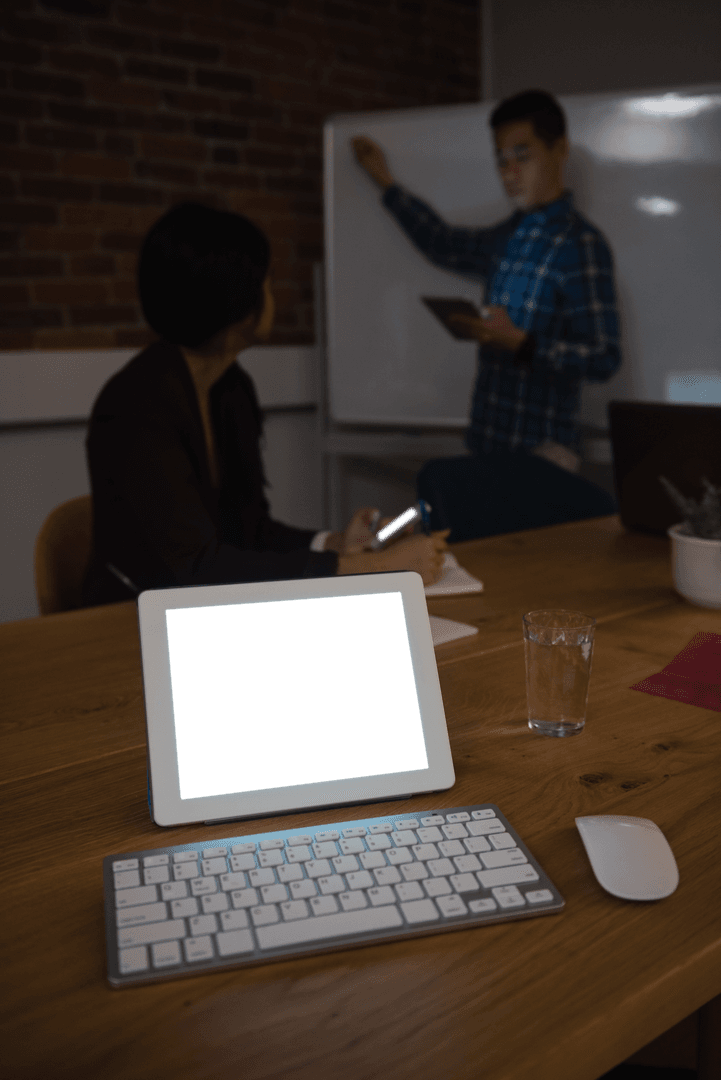 Transparent Screen in Business Meeting Room with Coworkers