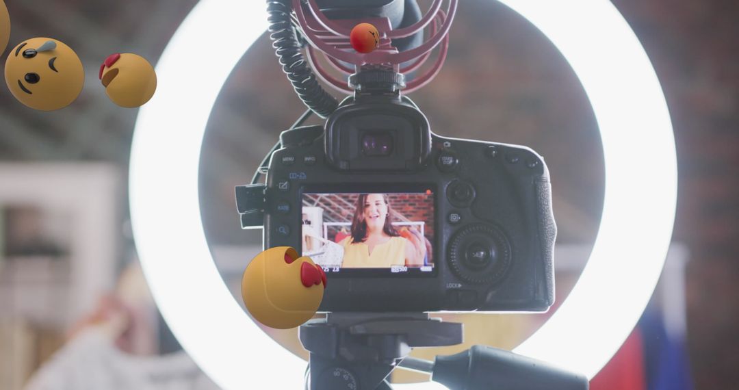 Vlogger Recording Content with Emoji Overlay at Home Studio
