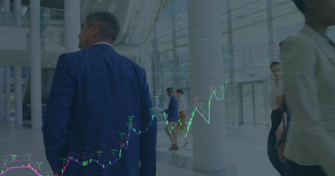 Business Professionals with Financial Graph Overlay in Office