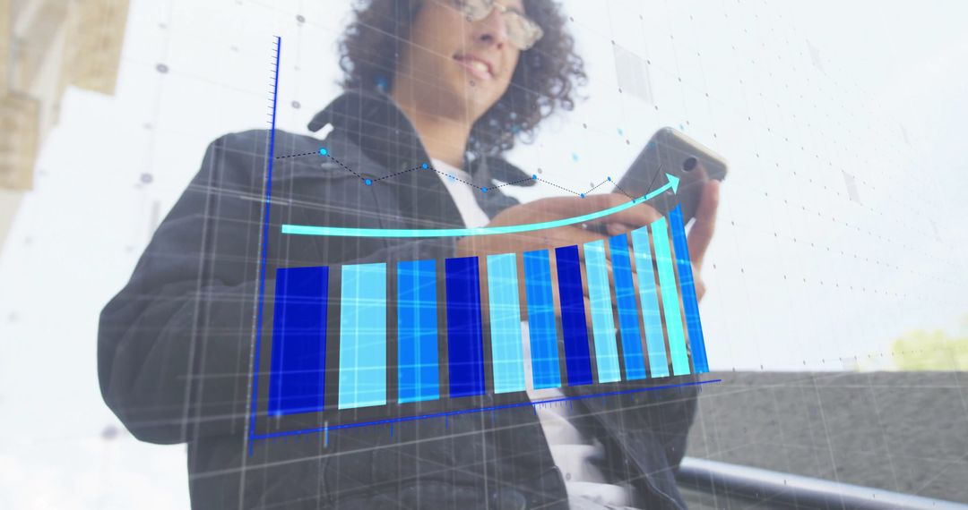 Man Analyzing Financial Data on Smartphone with Chart Overlay