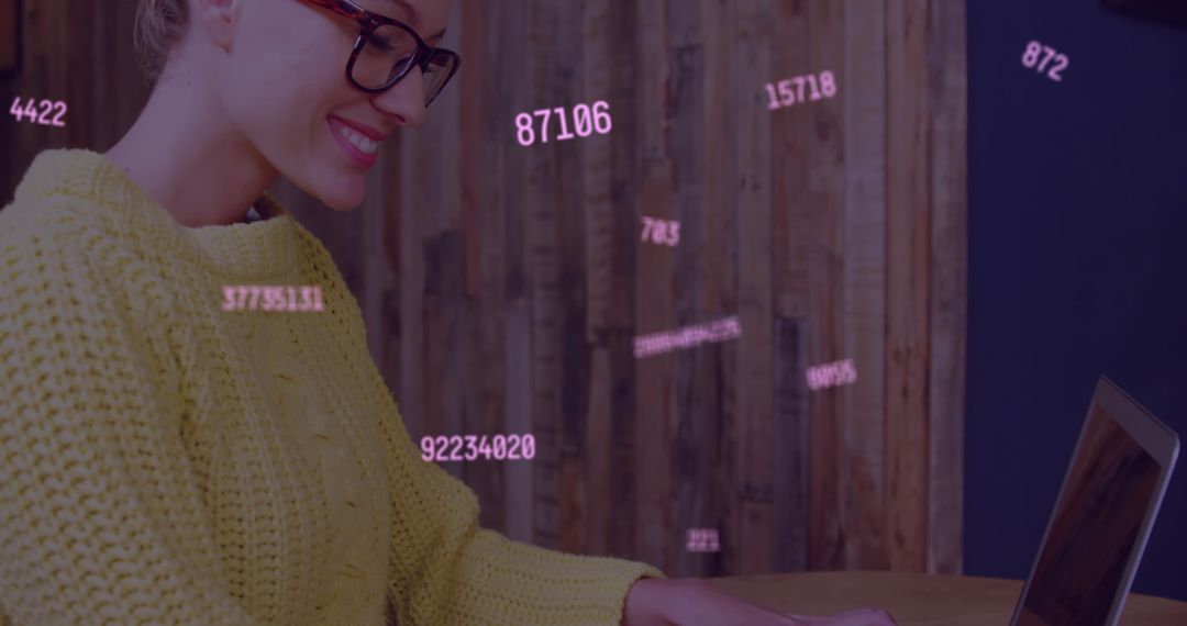 Happy Woman Using Laptop with Floating Numbers Displayed