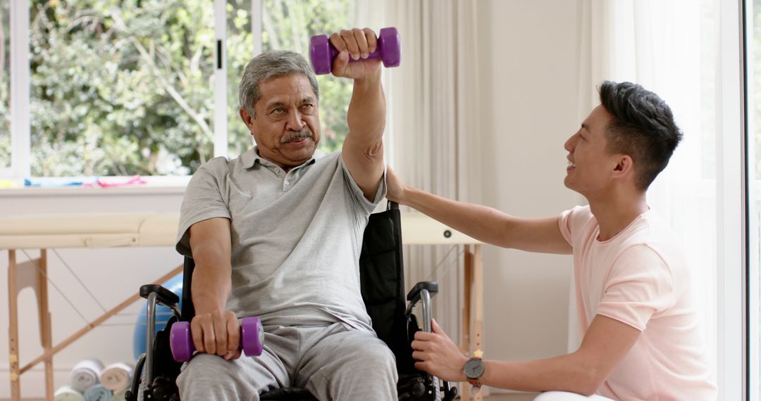 Young Caregiver Assisting Elderly Man with Exercise - Free Images, Stock Photos and Pictures on Pikwizard.com