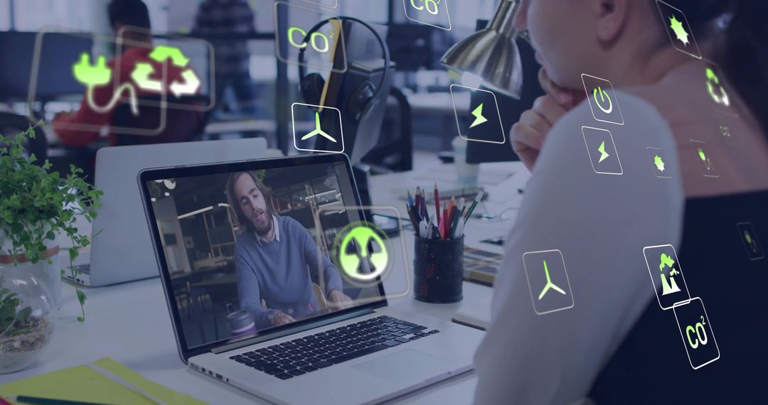 Office Worker Engaging in Virtual Meeting with Sustainable Innovation
