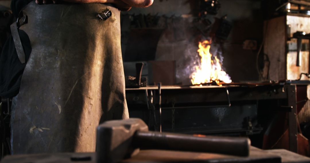 Blacksmith Working in Old Forge with Metal and Fire - Free Images, Stock Photos and Pictures on Pikwizard.com