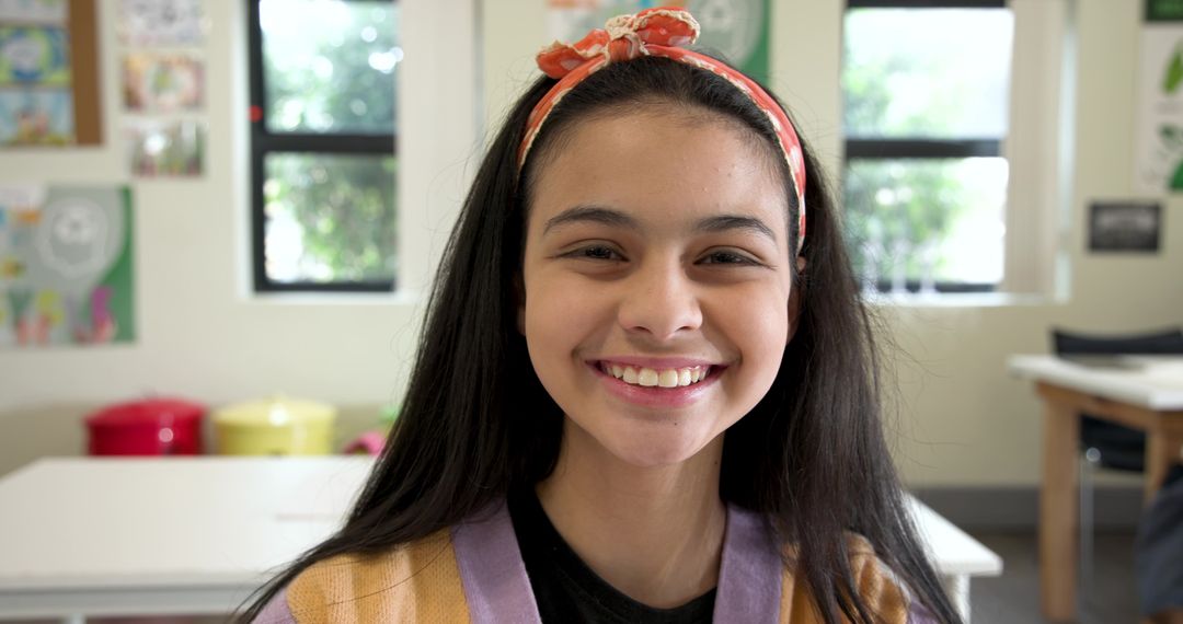 Smiling Girl Student at Classroom Desk Promoting Learning