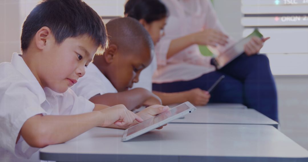 Diverse Children Learning with Digital Tablets in Classroom