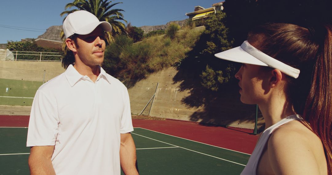 Tennis Coach Conducting Outdoor Training Session with Female Player - Free Images, Stock Photos and Pictures on Pikwizard.com