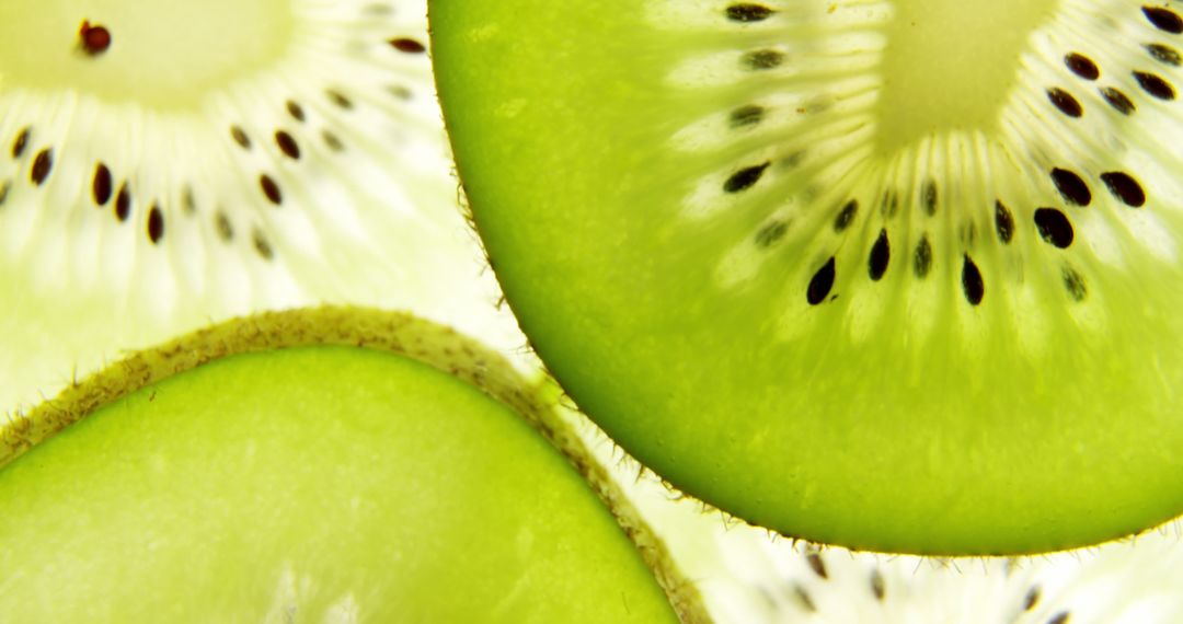 Close-Up Kiwi Slices with Heart Icons for Vegetarian Celebration