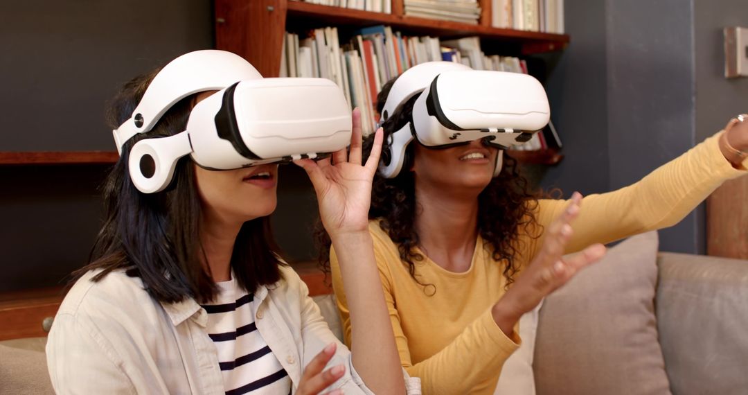 Women Experiencing Virtual Reality at Home with VR Headsets