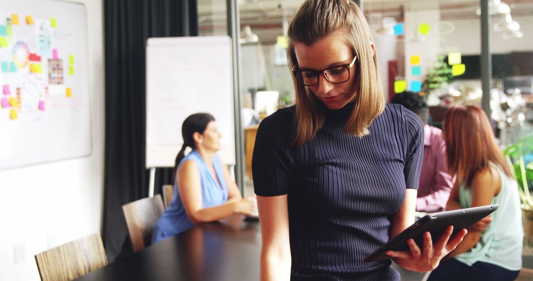 Modern Business Professional Working with Technology in Office