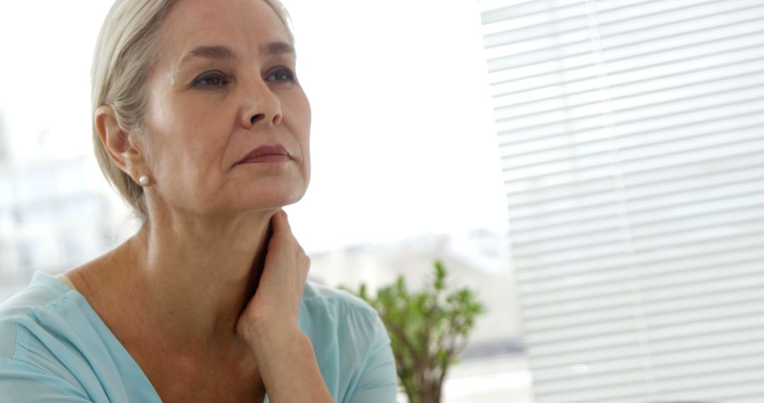 Senior Woman Contemplating at Home - Free Images, Stock Photos and Pictures on Pikwizard.com