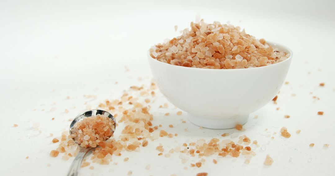 Himalayan Pink Salt in Bowl and Spoon on White Background - Free Images, Stock Photos and Pictures on Pikwizard.com